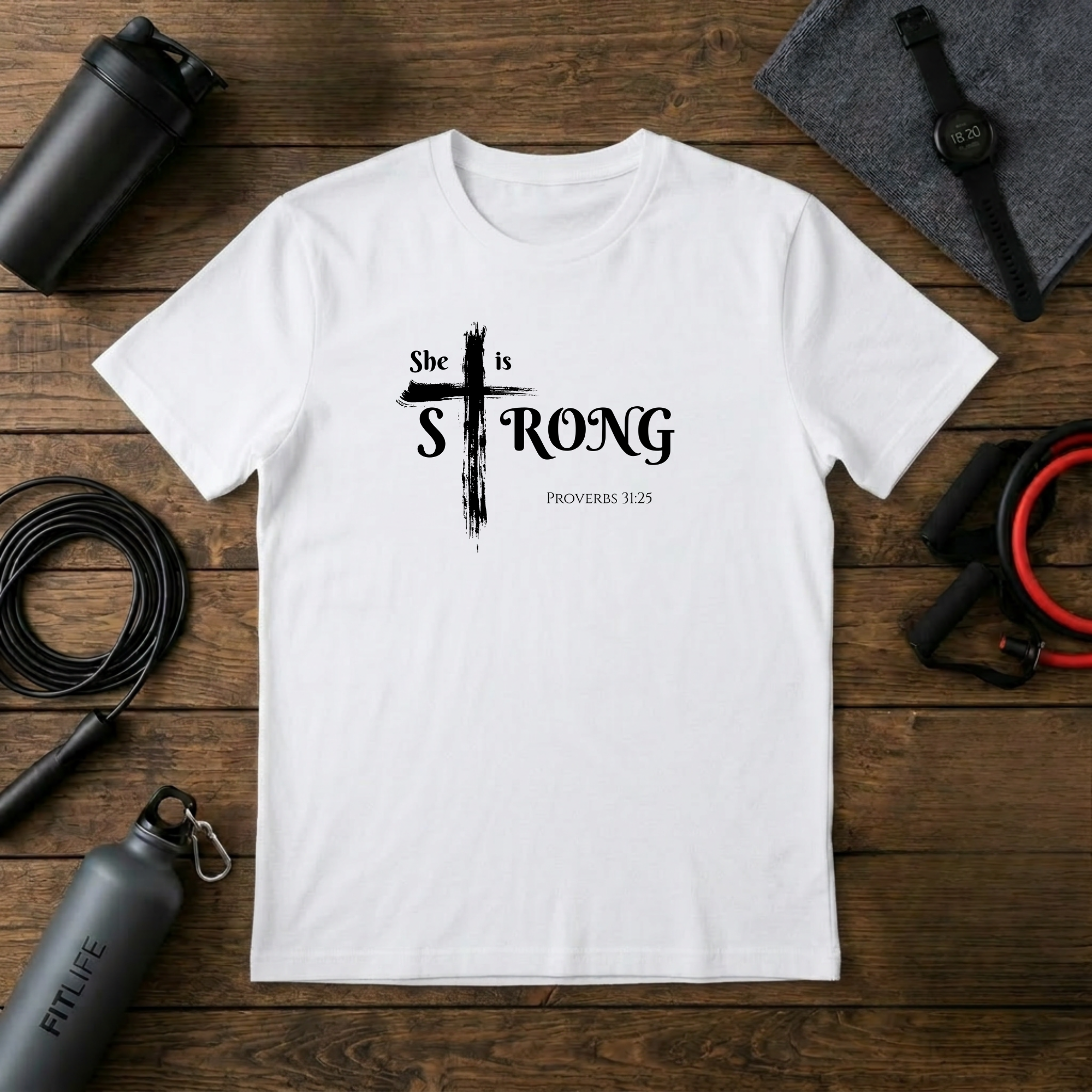 She Is Strong – Proverbs 31:25 Cross T-Shirt