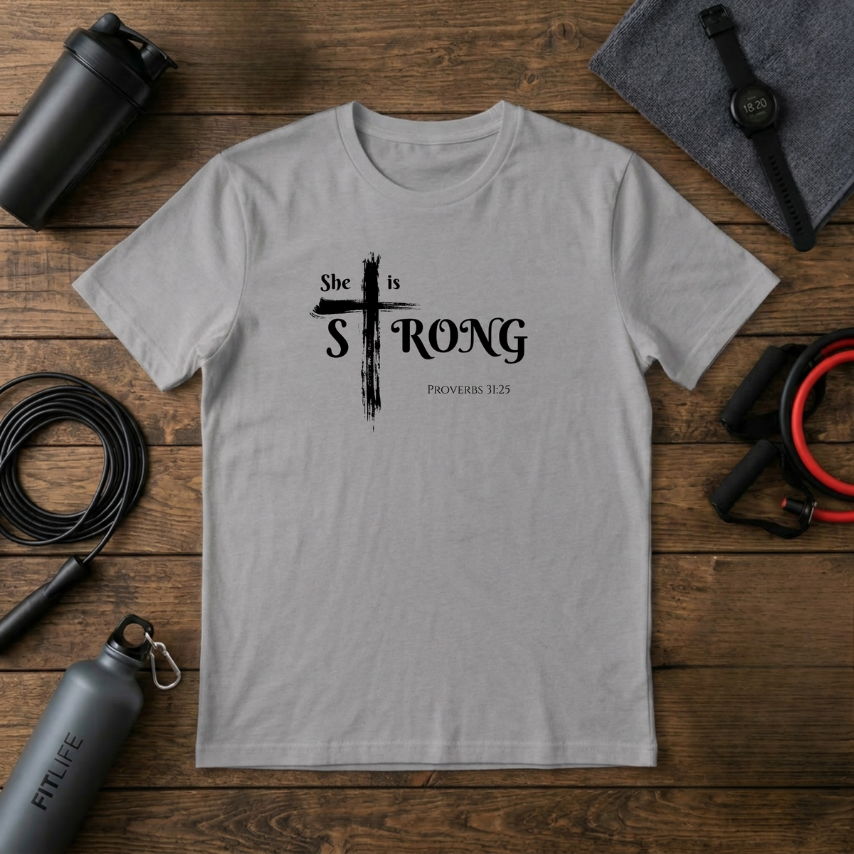 She Is Strong – Proverbs 31:25 Cross T-Shirt